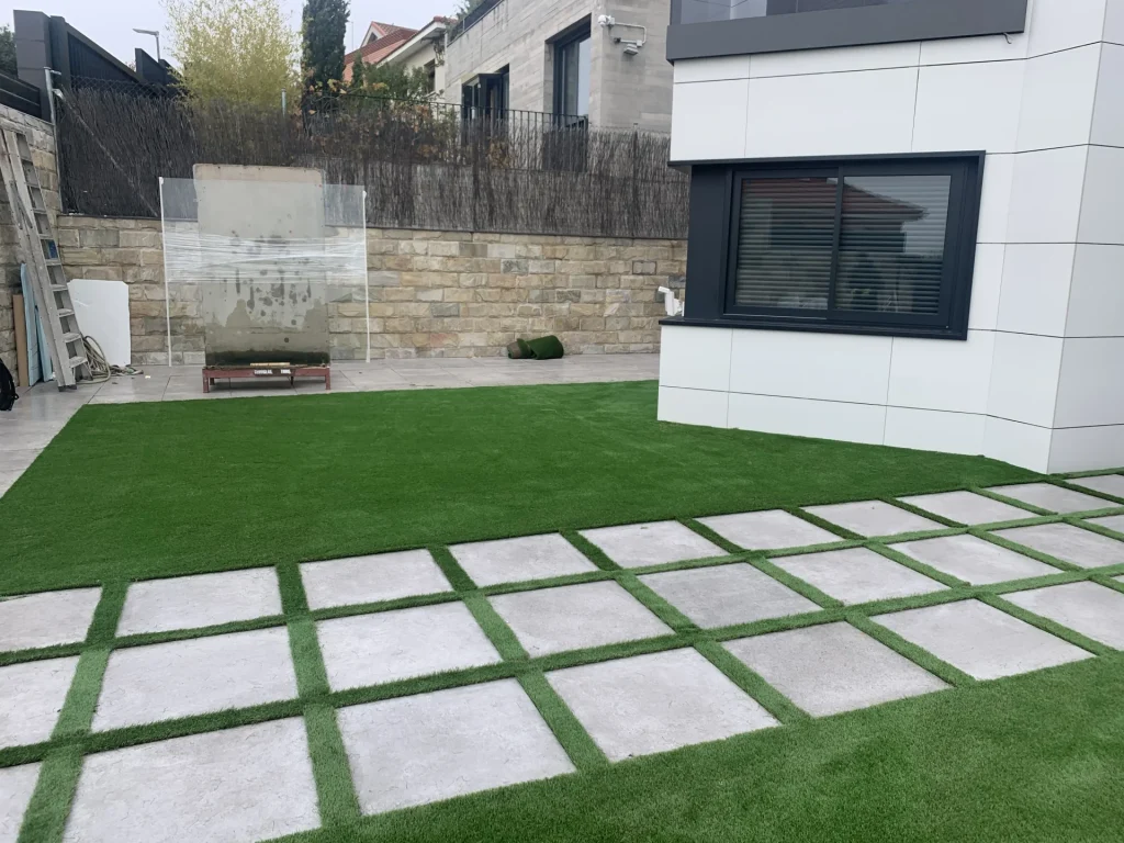 installation of artificial turf on concrete with drainage membrane